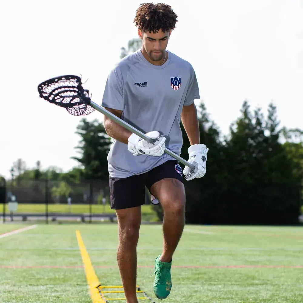 White sports jersey with a logo on the chest.