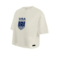 White T-shirt with blue USA logo and shield design.